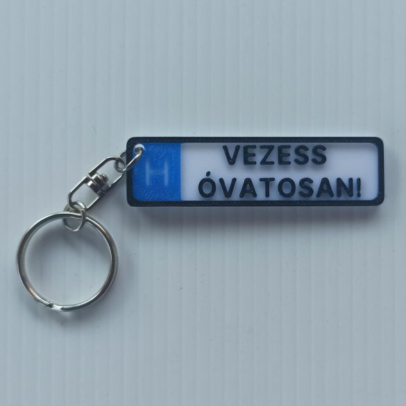 Rendszámtábla alakú kulcstartó (Vezess Óvatosan)